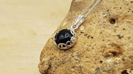 Tiny Obsidian pendant