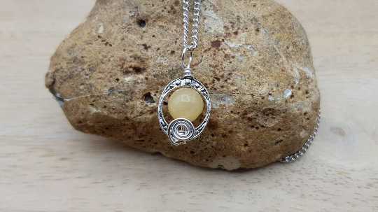 Small yellow calcite pendant