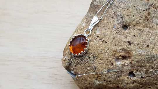 Tiny amber pendant