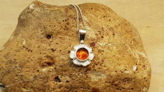 Tiny flower amber pendant