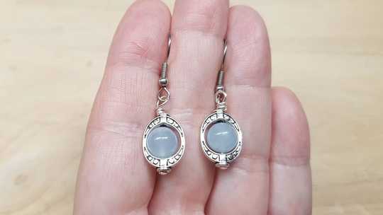 oval frame Aquamarine earrings