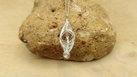 Herringbone wire wrap quartz pendant.