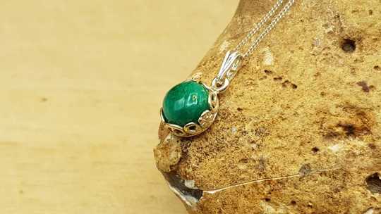 Tiny emerald pendant