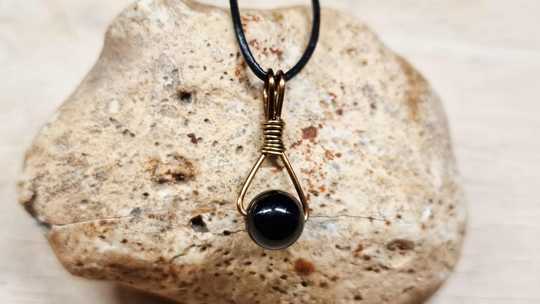 Unisex Shungite triangle pendant